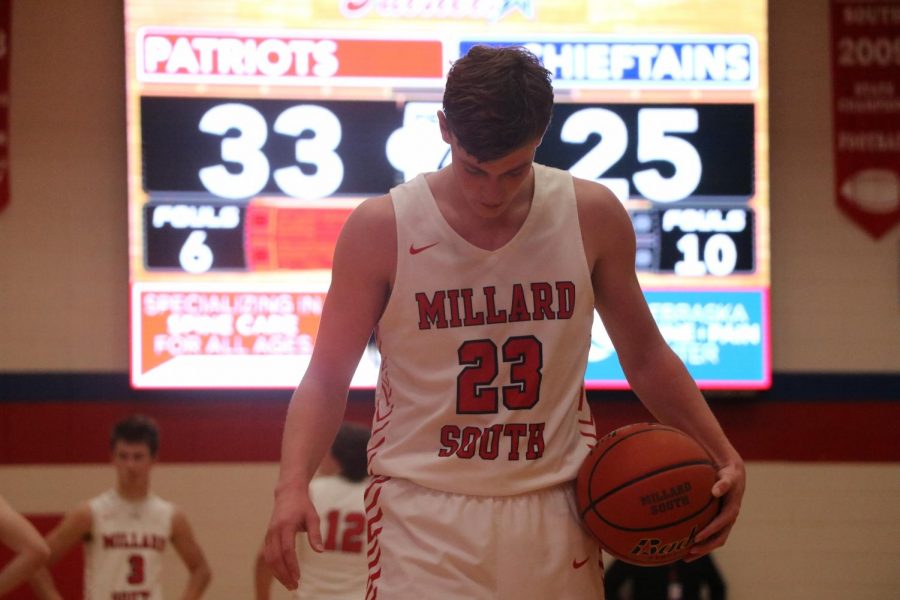 Senior+Michael+Harding+prepares+for+a+free+throw+in+the+game+against+Bellevue+West.+Photo+by+Caden+Blair.
