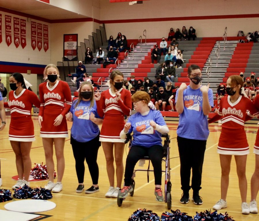 Senior+Carly+Barkus+cheers+with+her+friends+during+a+Unified+Cheer+performance.+Photo+courtesy+of+%40MSHSactivities.