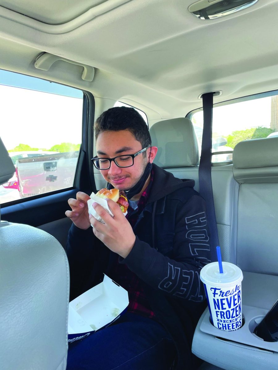 Digging in to his Culver’s, junior Gabriel Castro enjoys his chance to go out to lunch. This school year, seniors were not the only ones allowed to leave school for lunch.
     “I like having open lunch, because I can enjoy good food from outside of school with my friends,” he said.