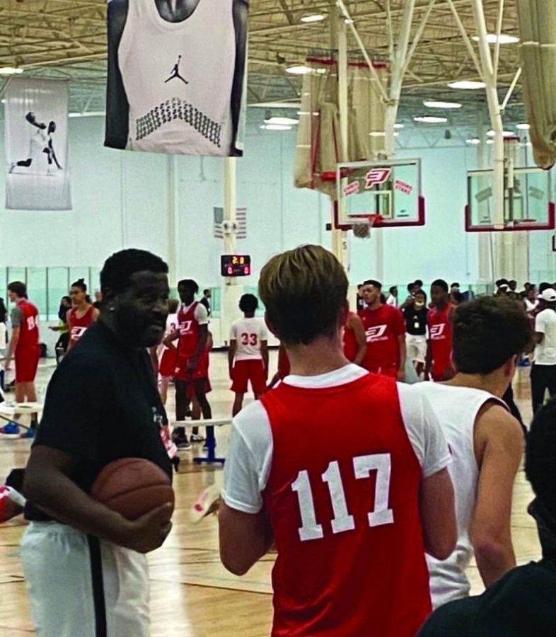 Sophomore Will Cooper hears from one of the many coaches at the Chris Paul Rising Stars Camo. He said the coaches at the camp made it really fun and energetic, gibing the campers the best experience possible. Photo courtesy of Will Cooper.