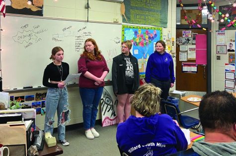 Freshman Ariah Herman and sophomores Shelbu Neeley, Luc Chaney, and Alexi Nielsen perform their group poem in front of an audience to practice for a competition. 
-Photo by Joni Beauchamp