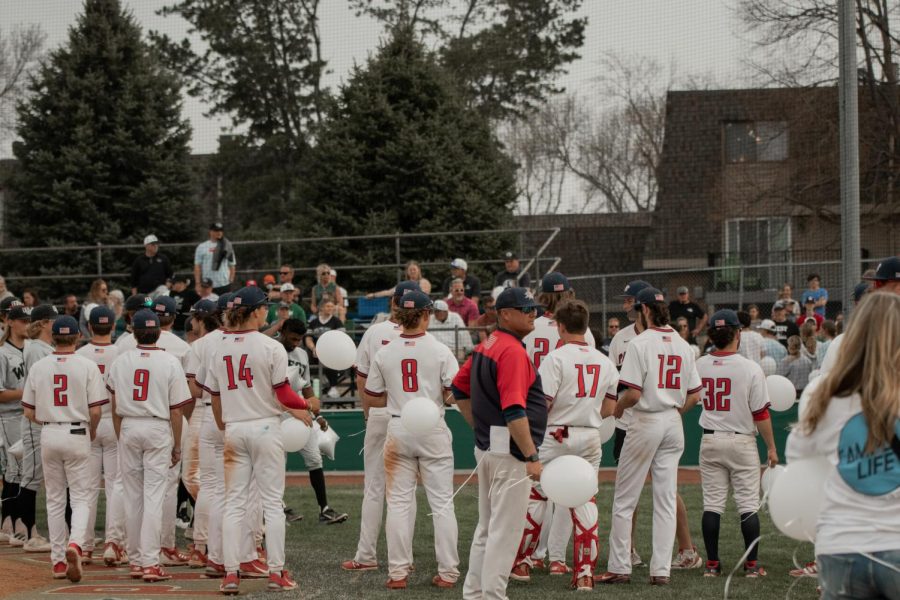Members+of+the+baseball+community%2C+including+the+Millard+South+and+Millard+West+varsity+roster%2C+release+balloons+ons+in+honor+of+Ralston+senior%2C+Tanner+Farrell.