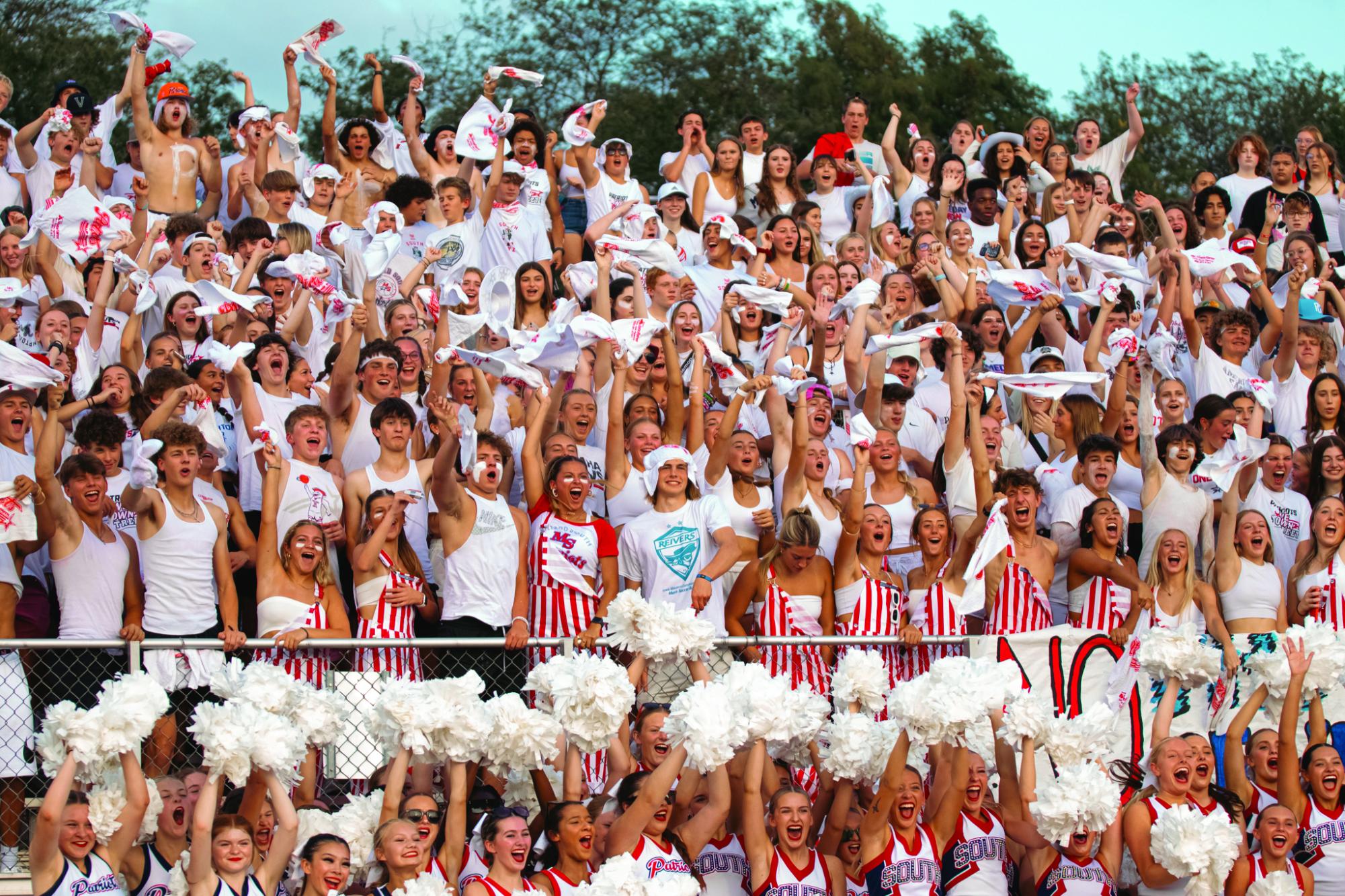 The student section gets riled up for the first football game. 