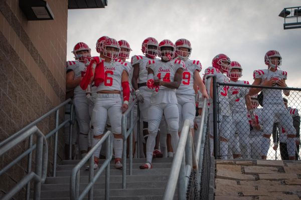 The Patriots walk out in enemy territory at Gretna featuring #6 Dylan Khul & #14 Delunn Jones.