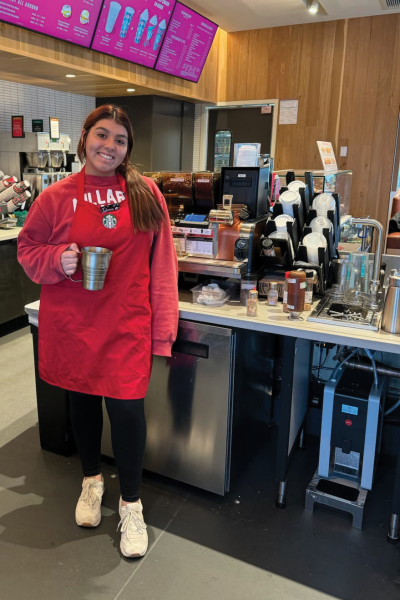 Jules Arias makes a hot peppermint mocha for one of her many customers. 