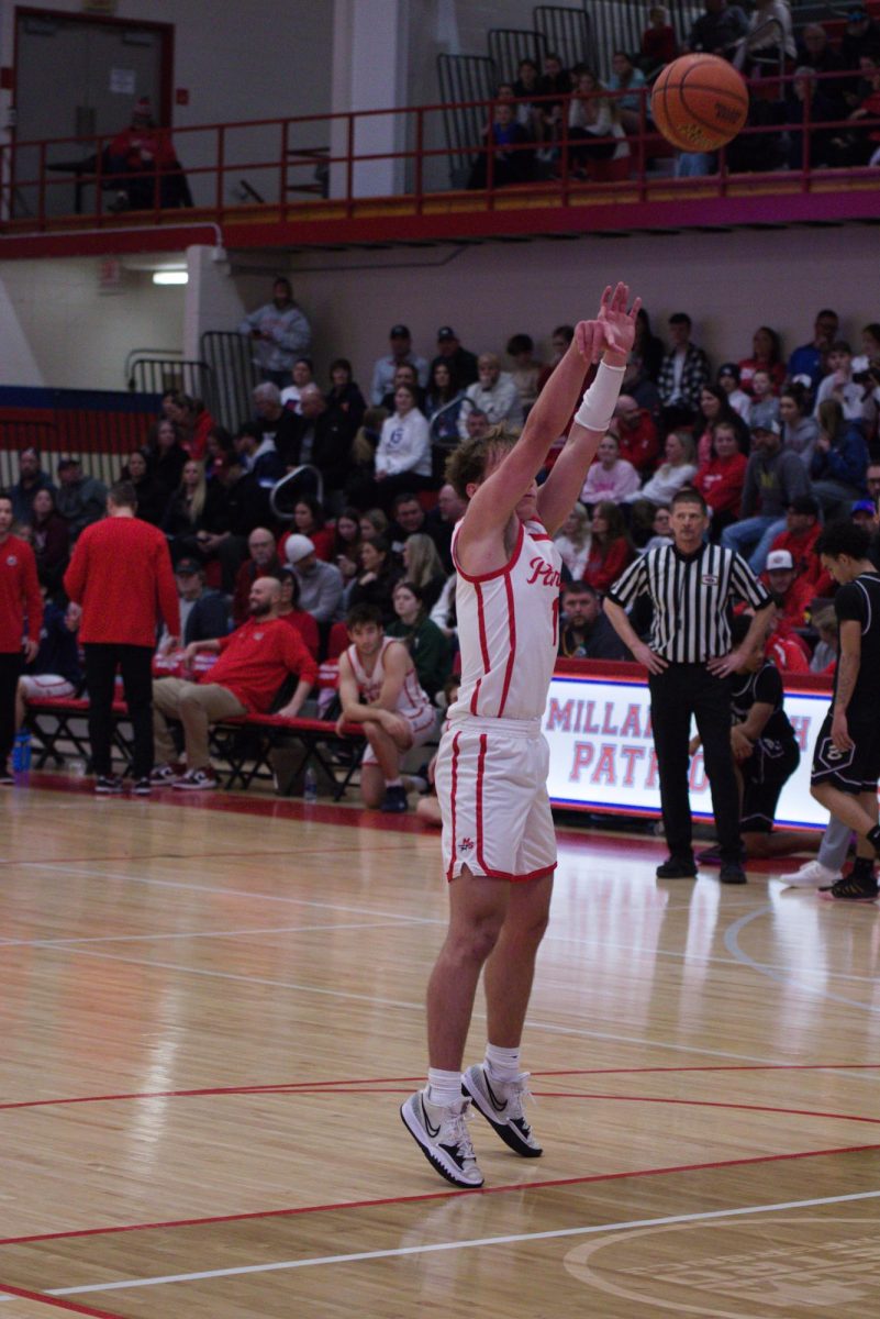 Junior Bernie Anderson nails free throw in game against Bellevue East. Anderson ended the game with 16 points.
