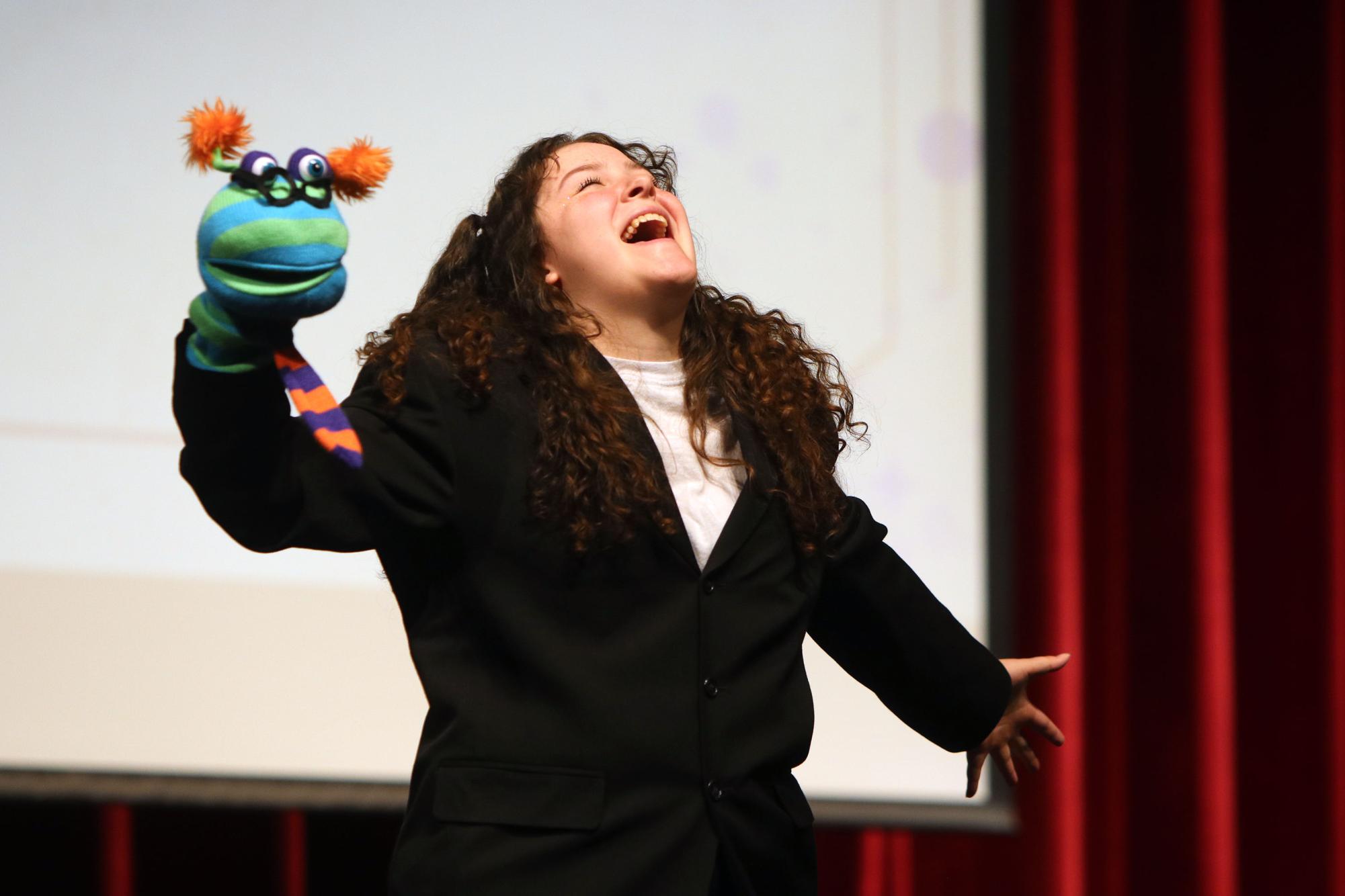 Zoie Wessling sings Man or Muppet from the 2011 movie The Muppets. Photo by Marissa Gergen.