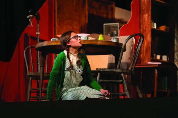 Anne (played by freshman Halle Hinton) reacts to being yelled at by Edith Frank for spilling milk on Mrs. Van Daans fur coat that was an important and expensive keepsake.