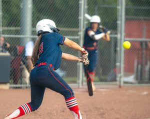 Caylen Goff hits the ball for a single.