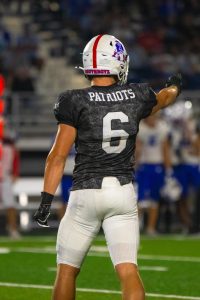 Dylan Kuhl Pointing to the Kearney Bearcats sideline.