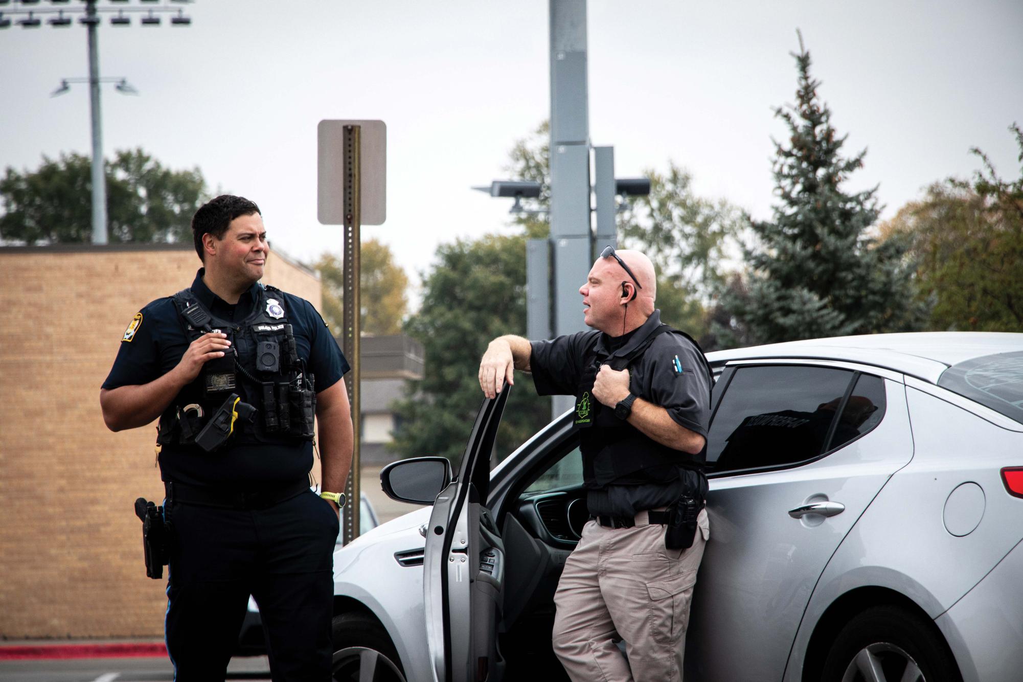 Omaha Police remain on campus after the threat was handled while students and parents try to exit the parking lot. 