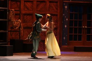 Peter Pan (Spencer Wickwire) and Tiger Lily (Halle Hinton) dance in celebration of defeating Captain Hook