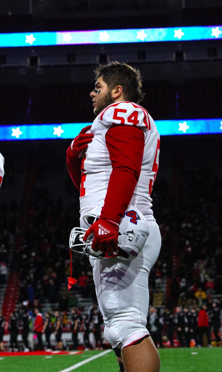 Defensive tackle Elijah Malesa stands during the National Anthem.