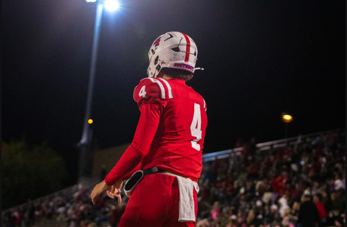 Jett Thomalla warming up on the sideline