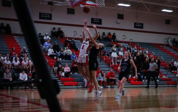 Junior Abbi Durow puts up a layup against Papio South