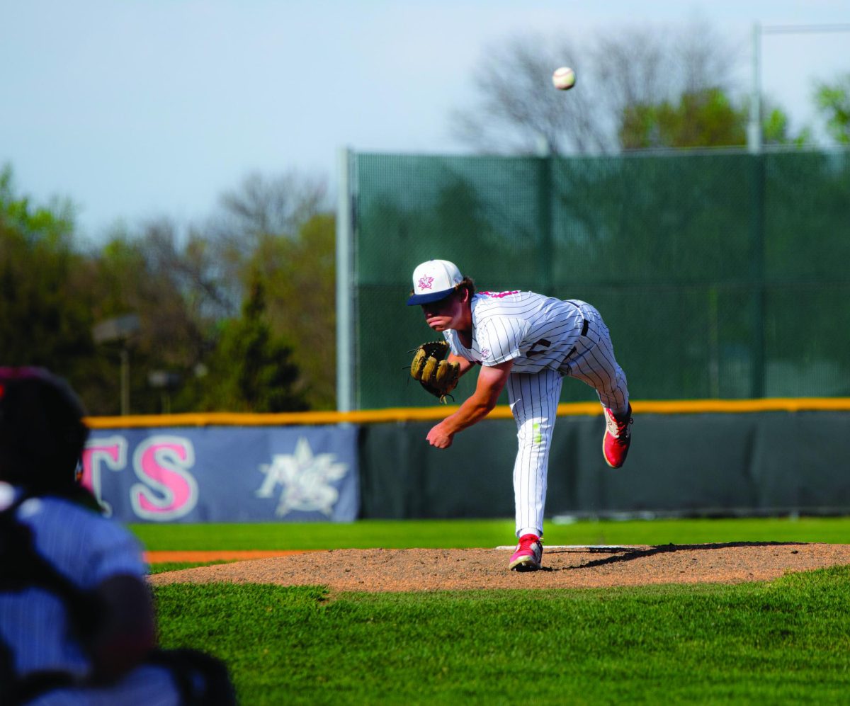Starting pitcher Jacob Altstadt fires a pitch in a Q Street rivalry. Alstadt pitched 4 innings with 3 runs and 5 strikeouts. Photo by Jack Moser