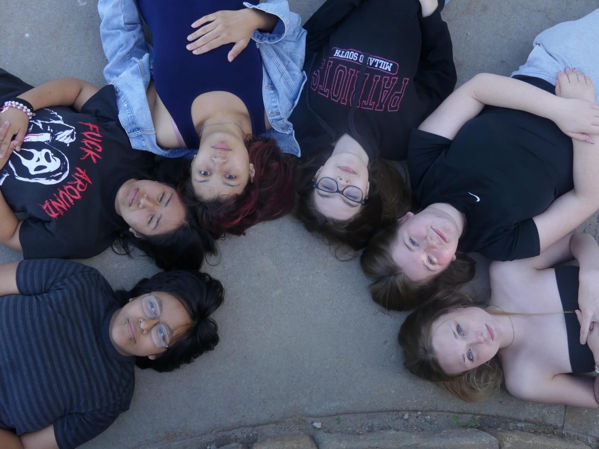 Students in Mrs. Kaldahl's Intro to Journalism class create an image that shows flattering light on every skin tone.