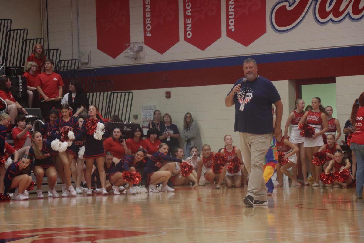 Activities Director Steve Throne addresses the class of 2029 at the pep rally held after 4th block.