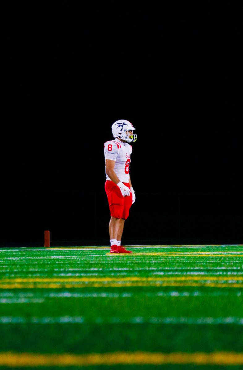 Running back Gabe Prucha looks over to the sideline waiting for the play.