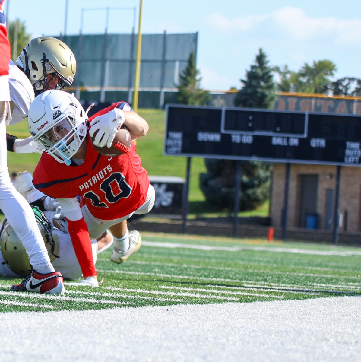 Reilly Rickard reaches the ball for the first down.