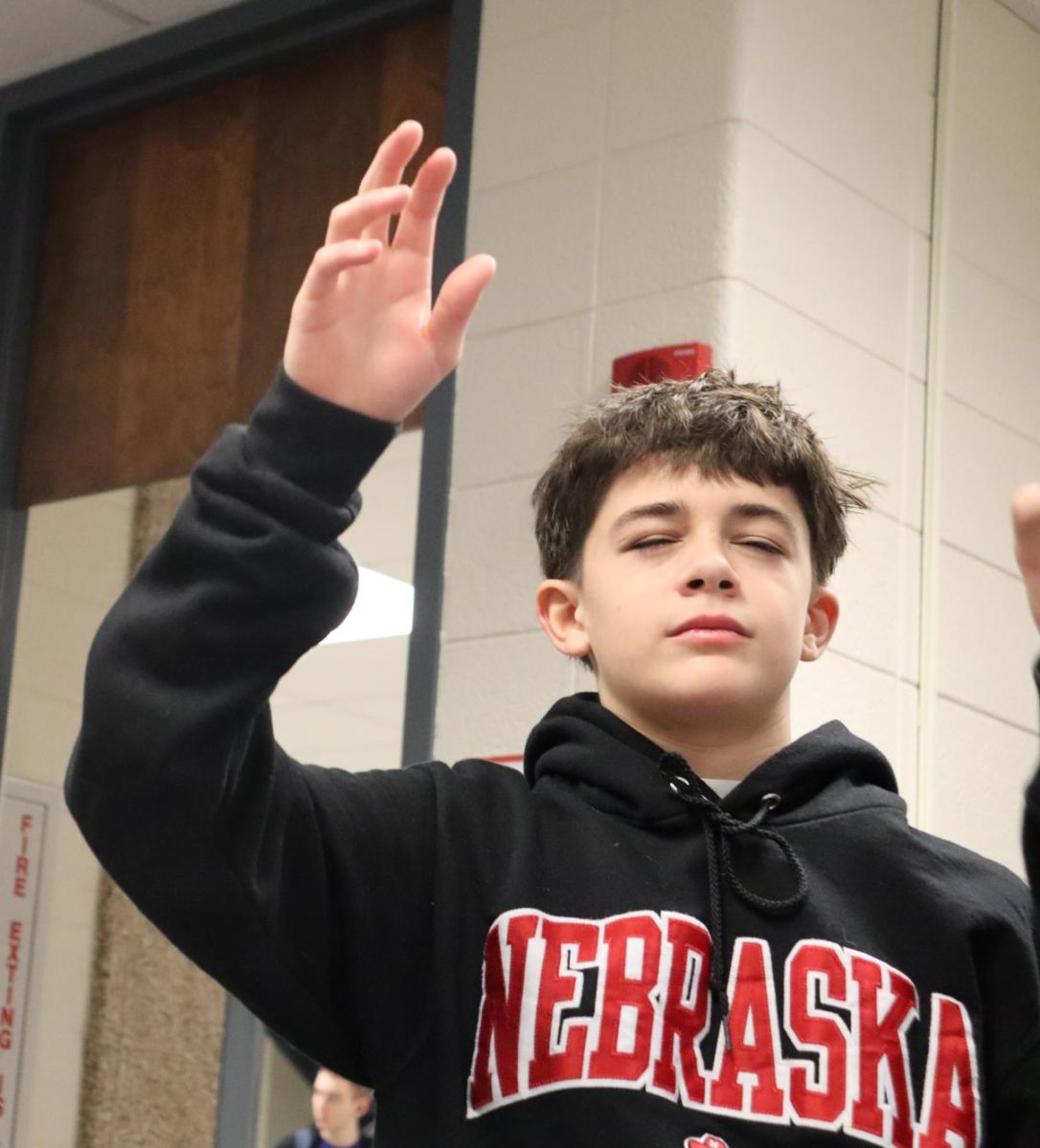 To close FCA meeting freshman Collin Riddle fills prayer request for fellow member set to have surgery soon 