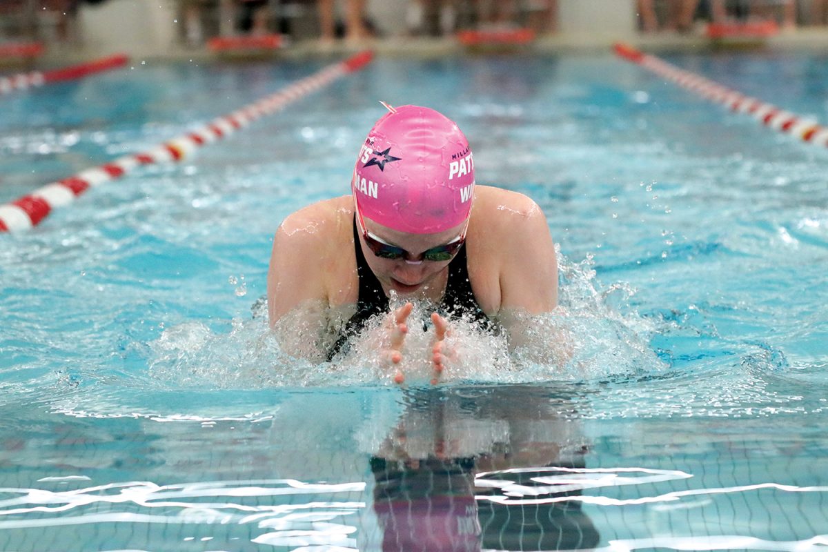 Sophomore Skyler Wiechman races in the 100 breaststroke at the Millard South Invite. 