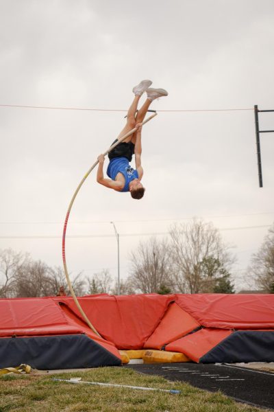 Senior Kendall Vanicek vaults at practice the week after the meet. He focused on gaining more speed and being tight to the pole to achieve new heights.