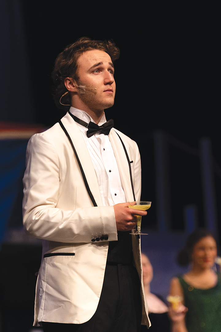 Passengers of the S.S American worship Public Enemy Number 1, Billy Crocker (played by Ryan McConachie) for making their boat famous.